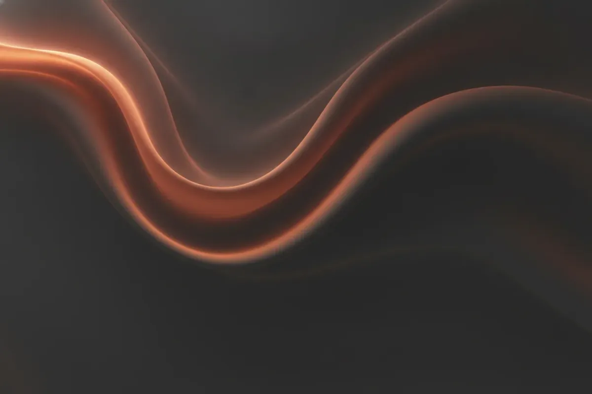 Warm light ribbons on a dark field